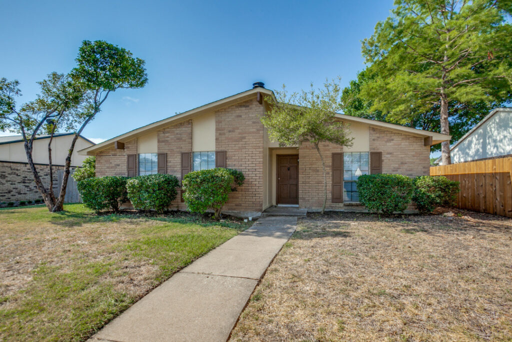 Exterior of one of the Dallas rental homes included in the five-home property-management portfolio.