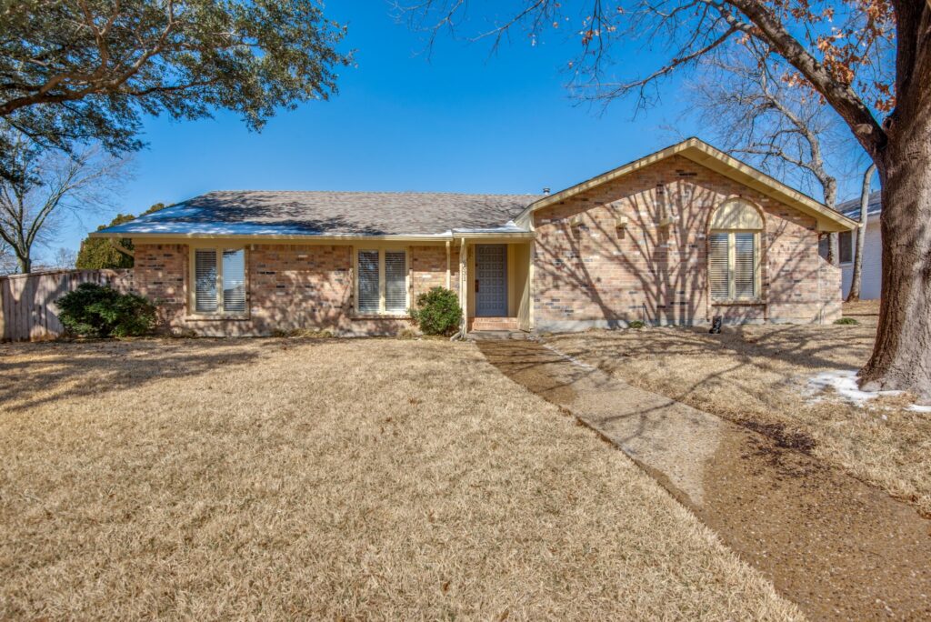 Exterior of one of the Carrollton rental homes within the five-home portfolio.